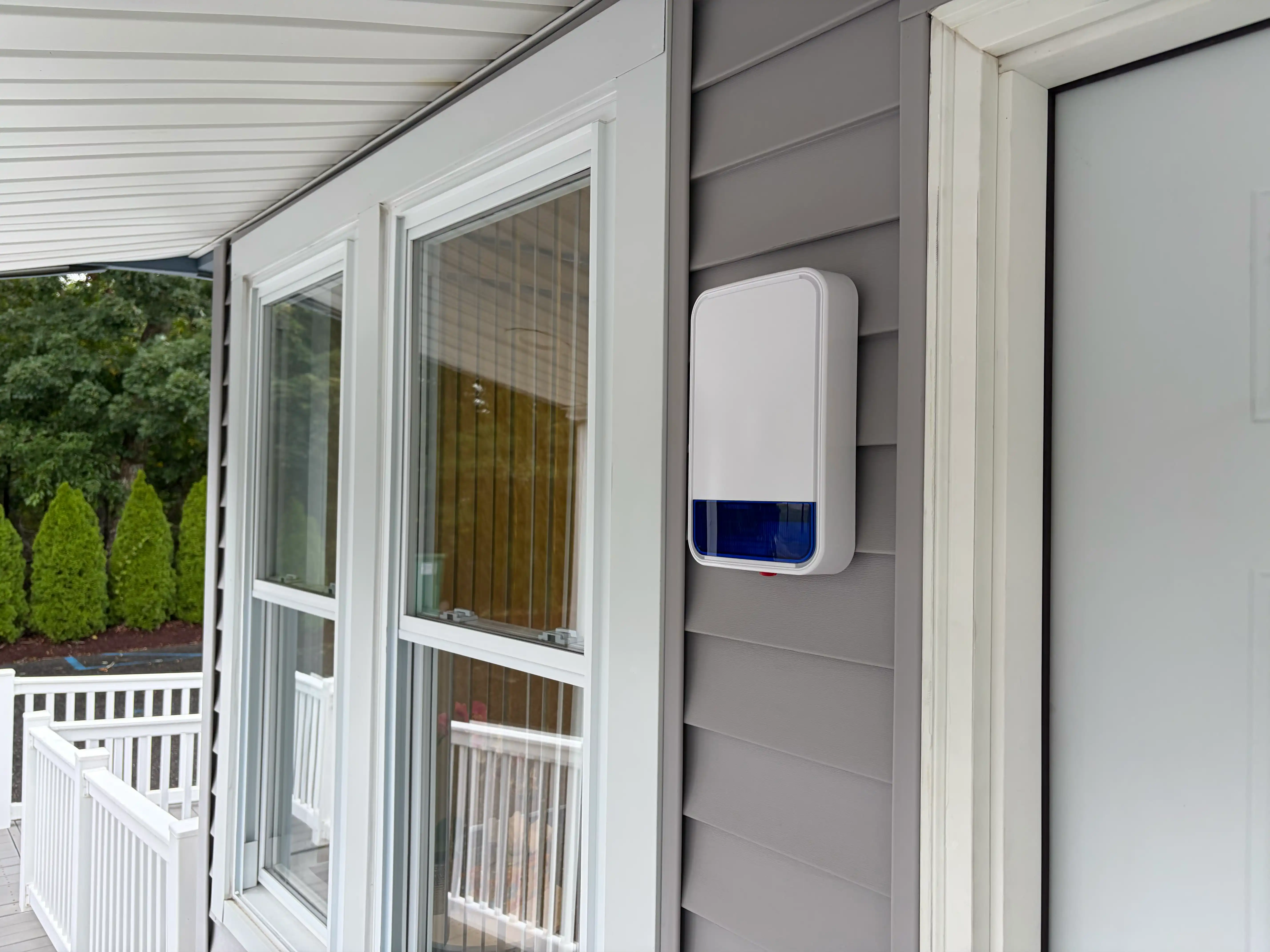 Exterior DSC alarm siren and strobe professionally installed by TRC Integrated.